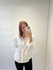 Chemise blanche brodé en forme de col v